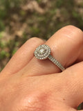 0.50 carat Engagement Ring. Certified 0.23 carat center diamond. Offering Layaway.